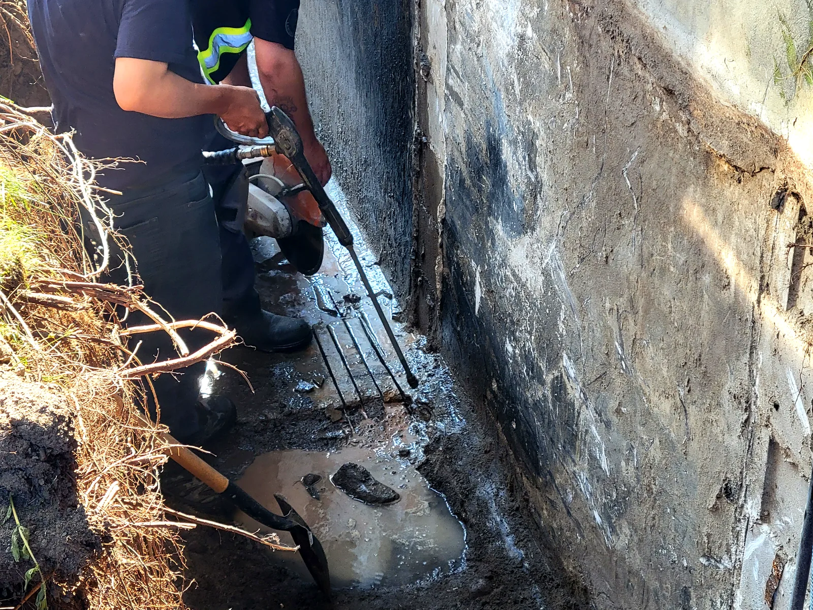 Stacy Provost and crew working an Ottawa exterior foundation repair